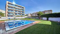 Swimming pool of Planta baja for sale in Calafell  with Air Conditioner, Heating and Private garden