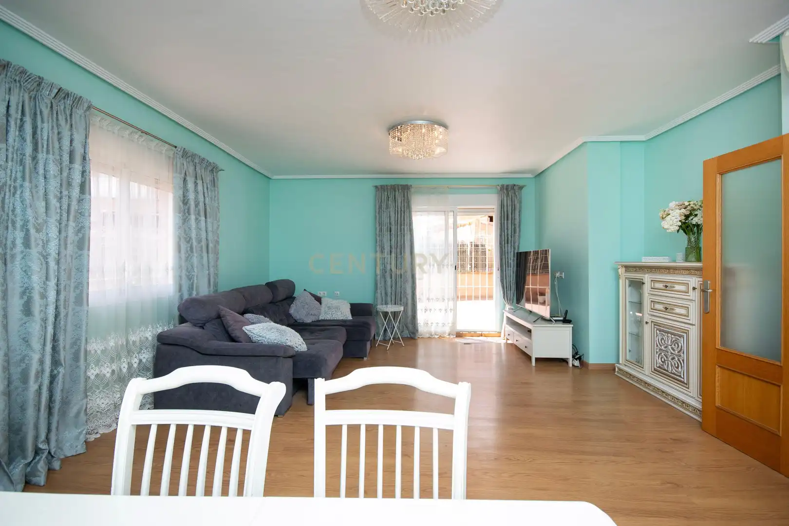 Sala de estar de Casa adosada en venta en Alicante / Alacant con Aire acondicionado, Balcón y Piscina comunitaria