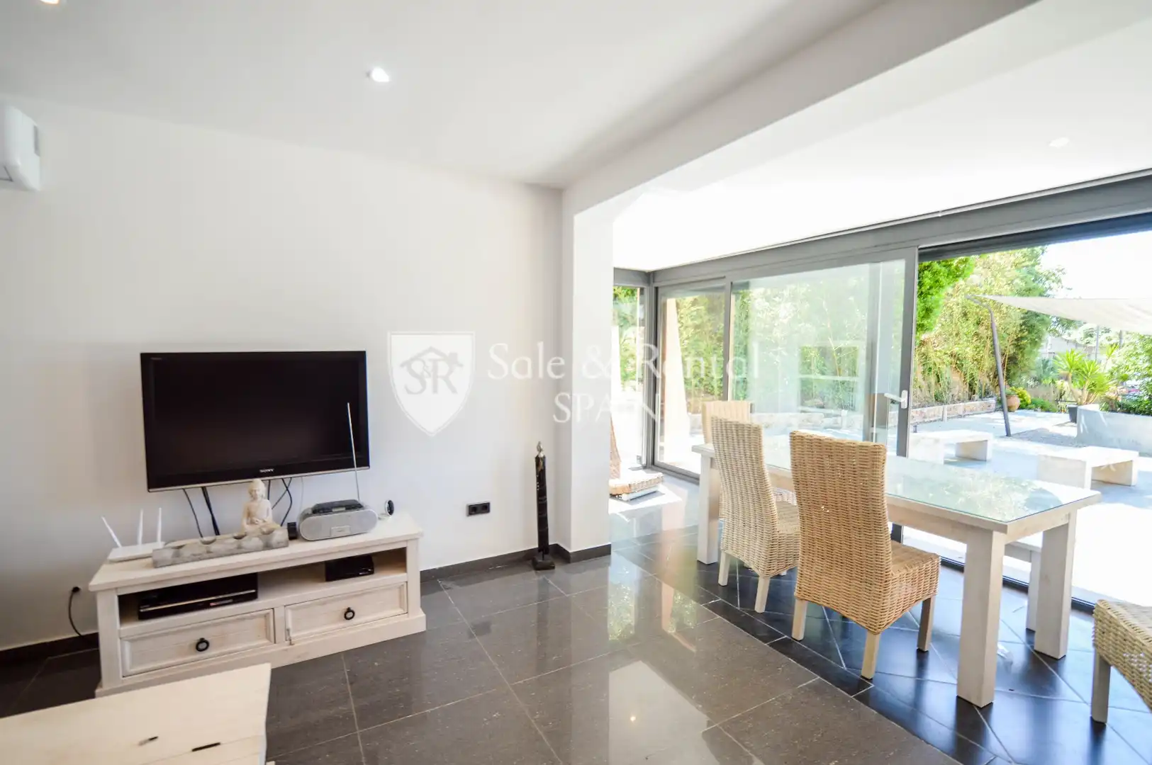 Sala d'estar de Casa o xalet en venda en Lloret de Mar amb Aire condicionat, Jardí privat i Terrassa
