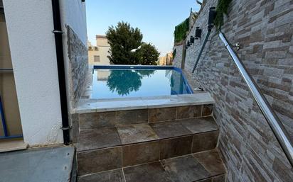 Piscina de Casa adosada en venda en Torremolinos amb Terrassa i Balcó