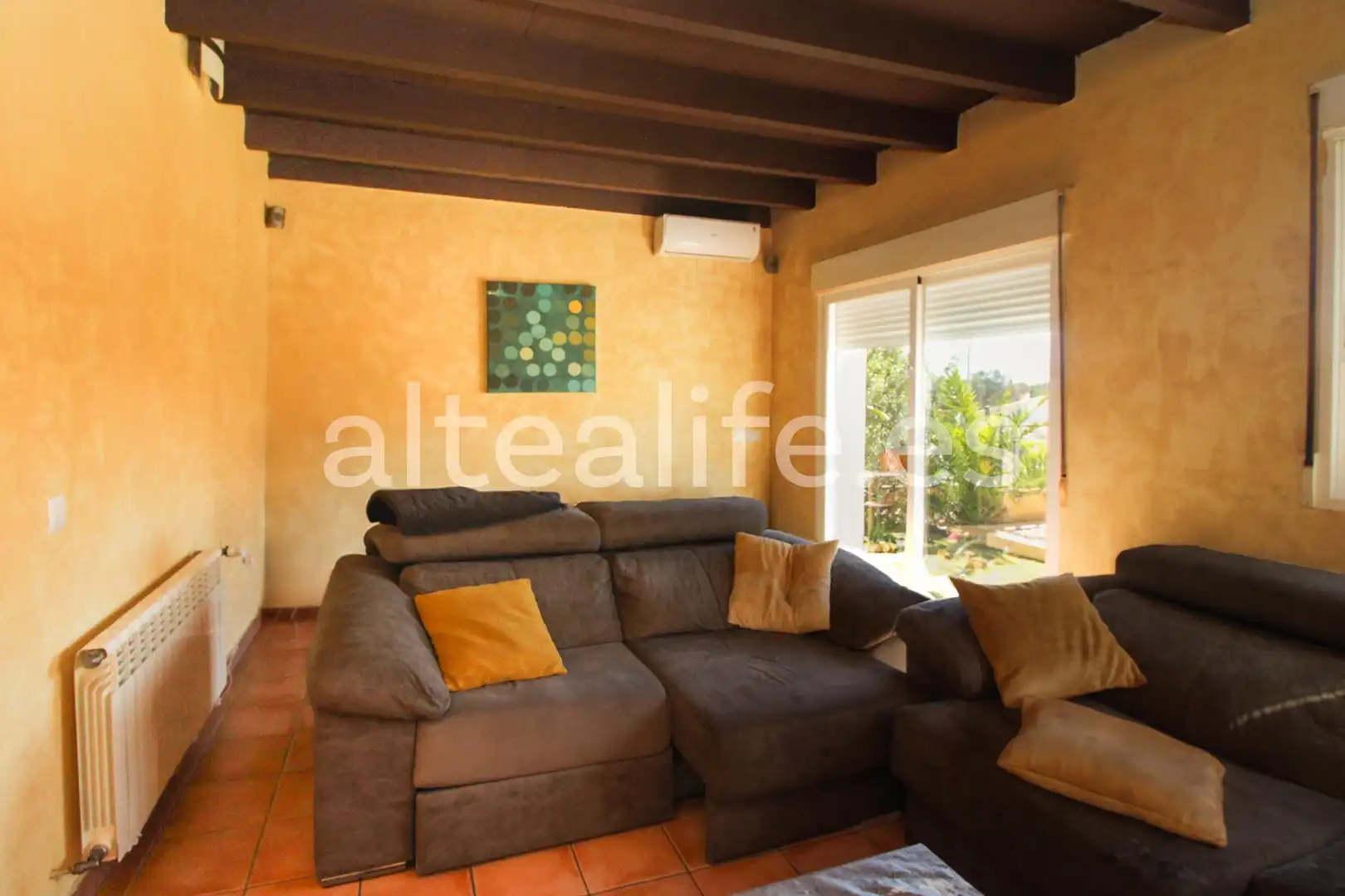 Sala de estar de Casa o chalet en venta en La Nucia con Aire acondicionado, Calefacción y Jardín privado