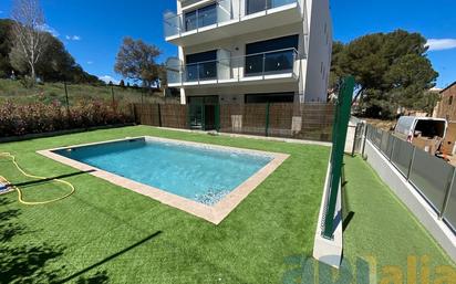 Swimming pool of Planta baja for sale in Palamós  with Air Conditioner, Heating and Terrace