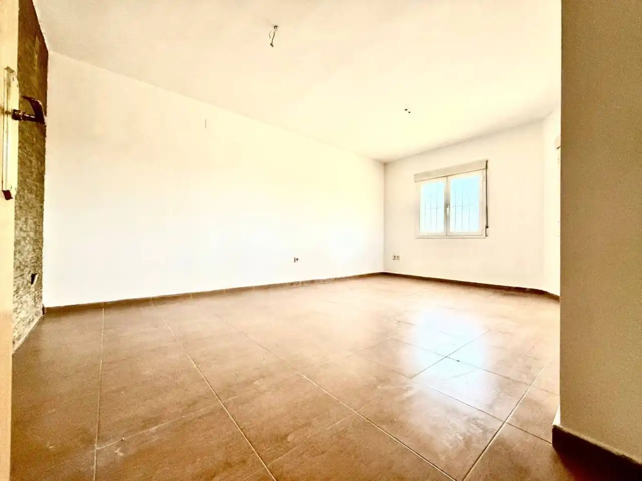 Sala de estar de Casa adosada en venta en Miguel Esteban con Alarma y Piscina comunitaria