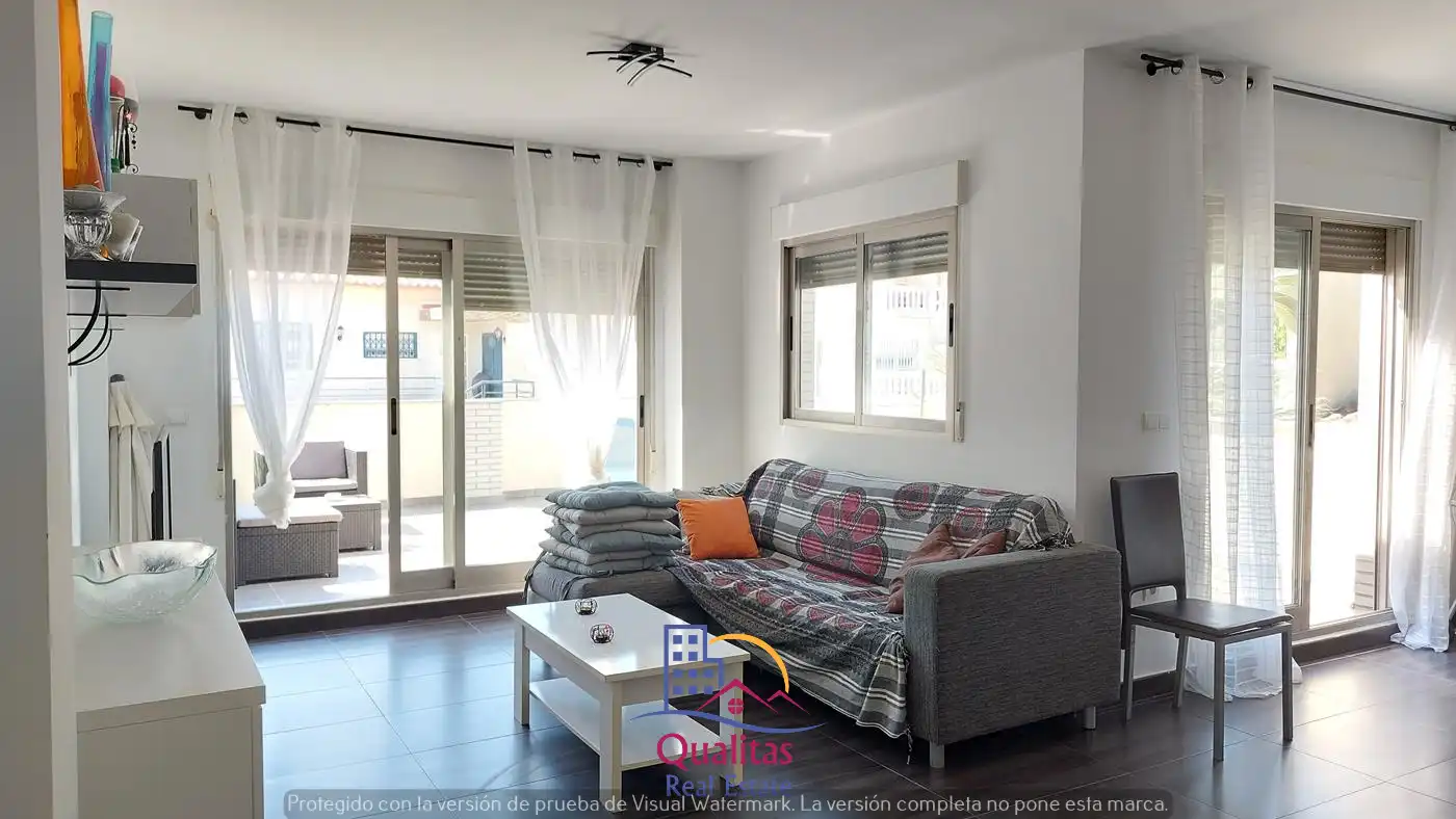Sala de estar de Casa adosada de alquiler en Oliva con Aire acondicionado, Calefacción y Terraza