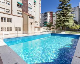 Swimming pool of Flat for sale in  Granada Capital  with Air Conditioner, Heating and Private garden