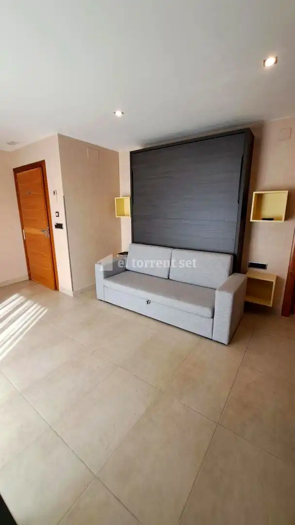 Sala d'estar de Estudi de lloguer en Sant Vicenç de Montalt amb Aire condicionat, Terrassa i Moblat