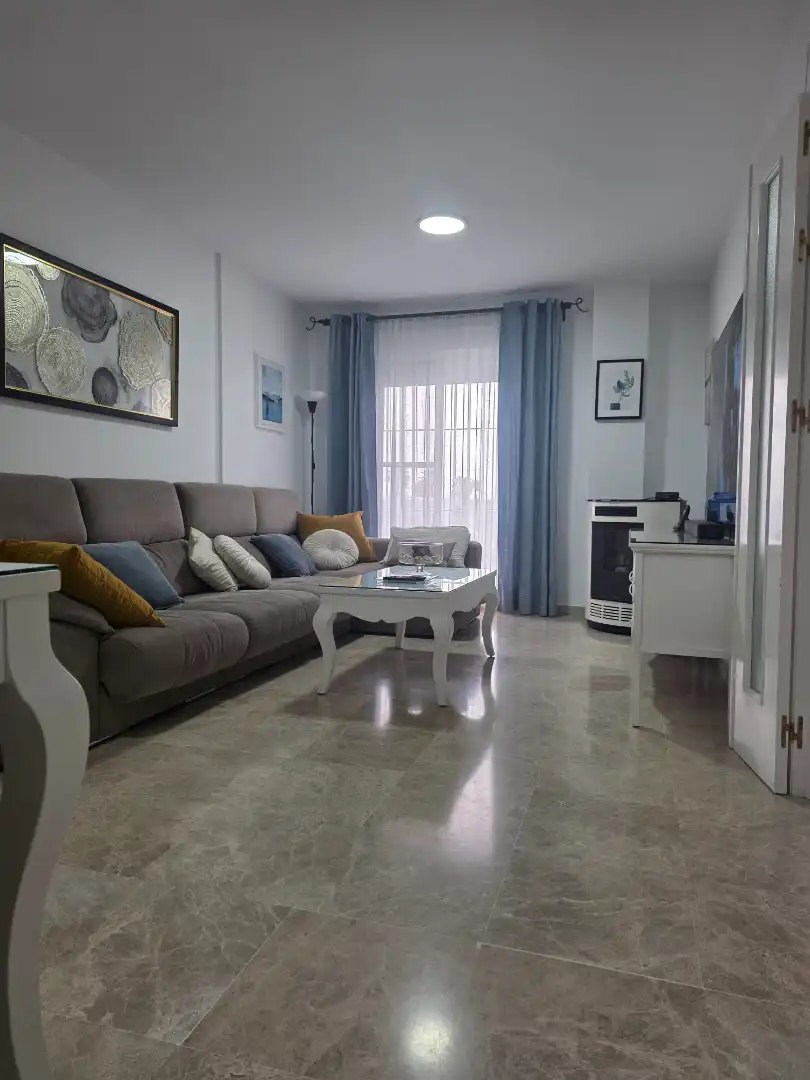 Sala de estar de Casa adosada en venta en Utrera con Aire acondicionado, Jardín privado y Terraza
