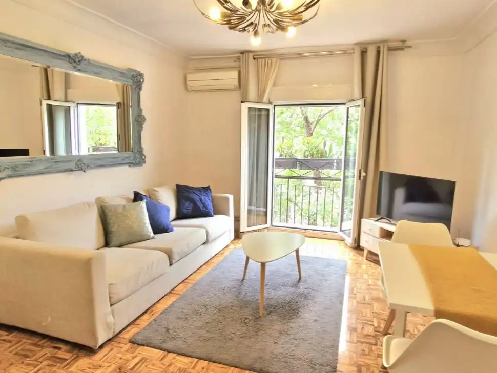 Sala de estar de Piso para compartir en Madrid con Calefacción, Parquet y Amueblado