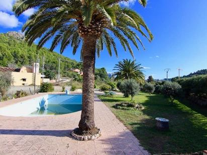 Vista exterior de Casa o xalet en venda en Pedreguer amb Calefacció, Jardí privat i Terrassa