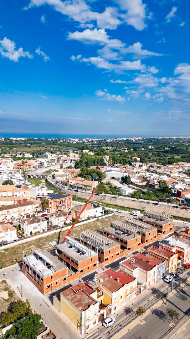 Exterior view of Single-family semi-detached for sale in Els Poblets  with Air Conditioner, Terrace and Storage room