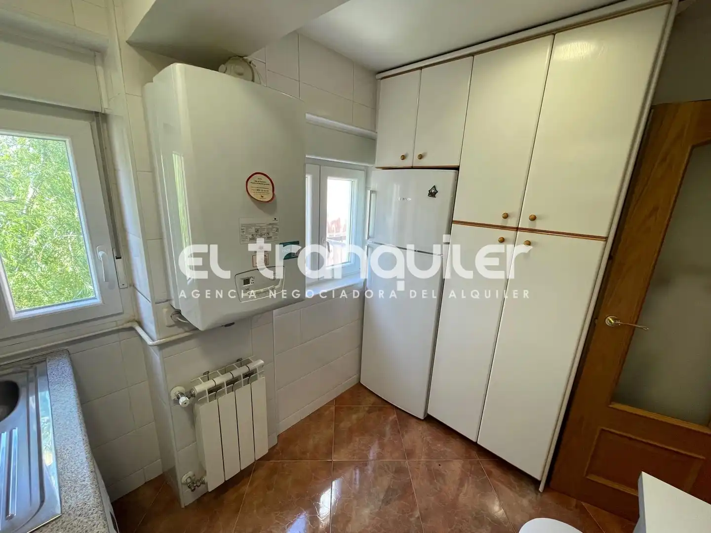 Cuina de Pis de lloguer en Madrid amb Terrassa i Moblat