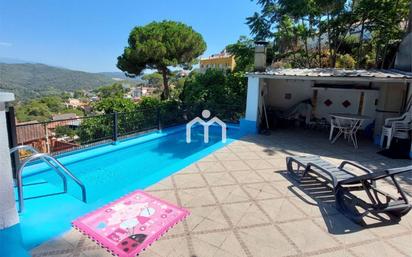 Swimming pool of House or chalet for sale in Argentona  with Air Conditioner, Heating and Terrace