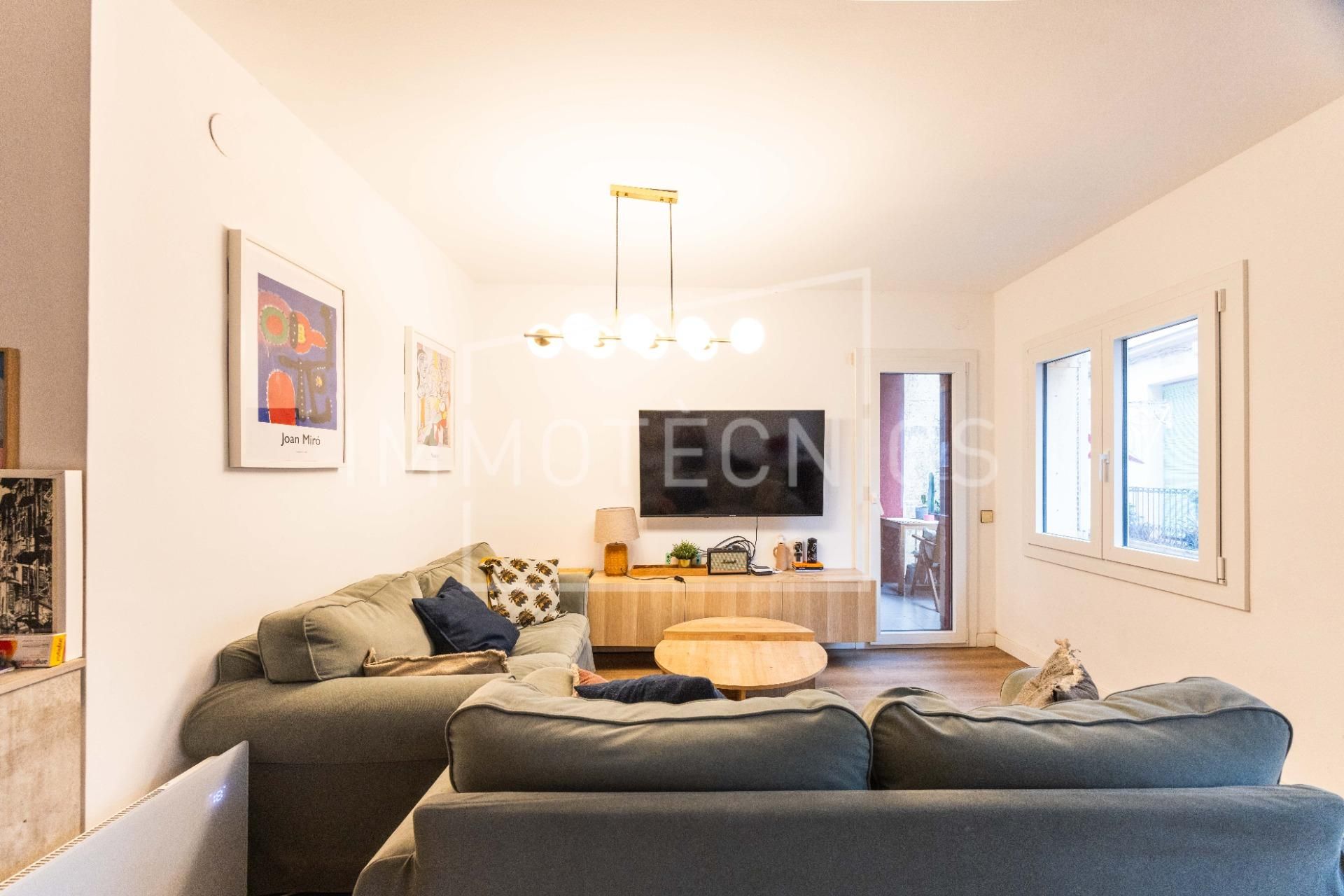 Living room of Flat for sale in Canet de Mar  with Heating, Parquet flooring and Terrace