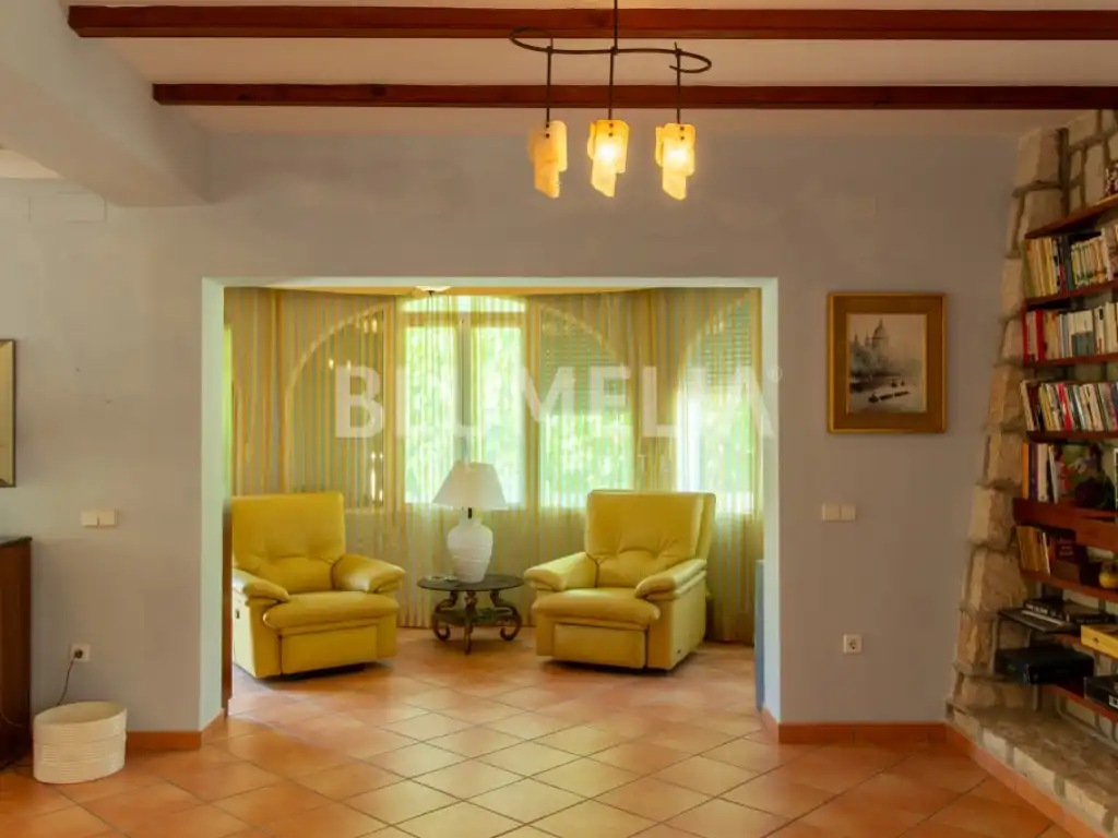 Sala d'estar de Casa o xalet en venda en Dénia amb Aire condicionat, Jardí privat i Terrassa