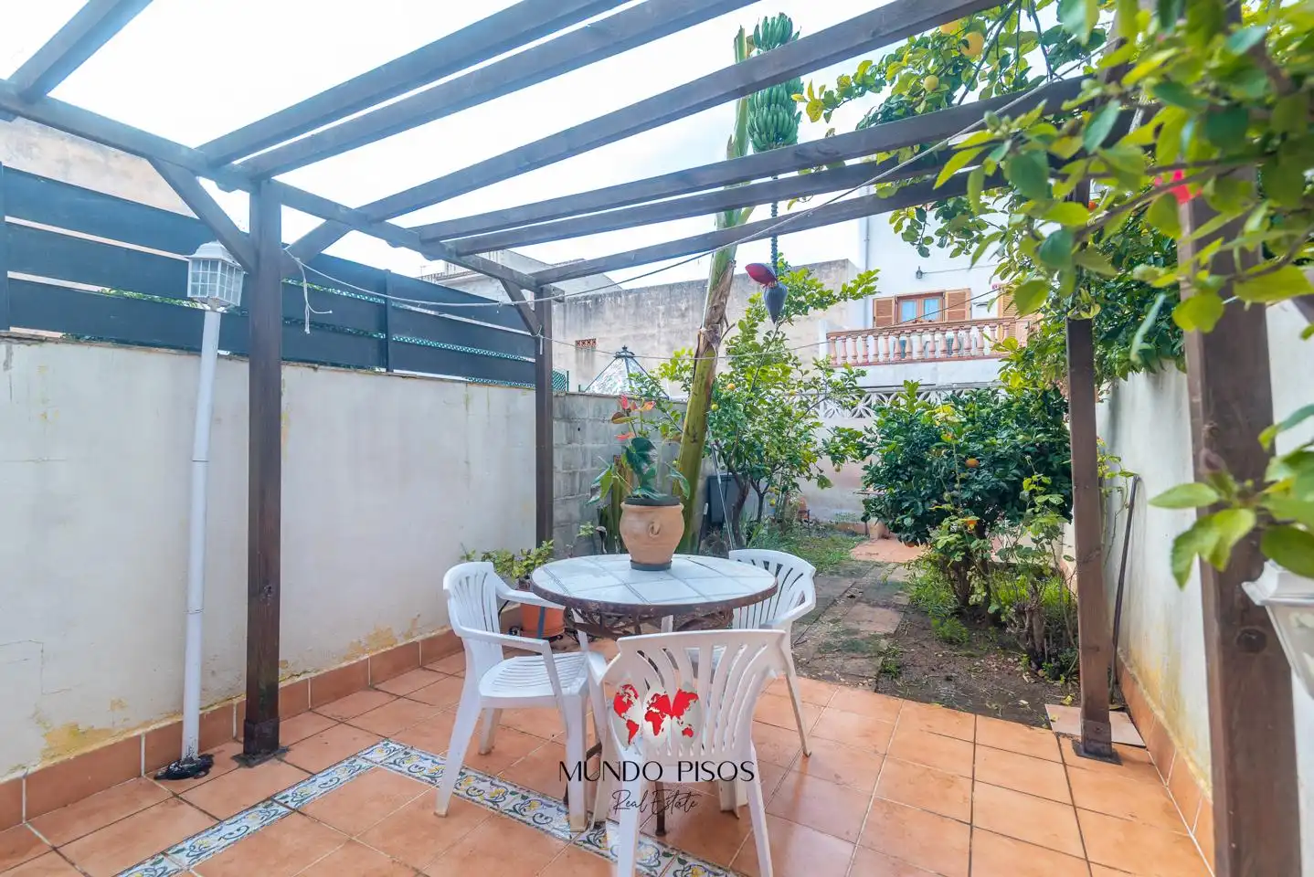 Garten von Einfamilien-Reihenhaus zum Verkauf in Consell mit Klimaanlage, Heizung und Privatgarten