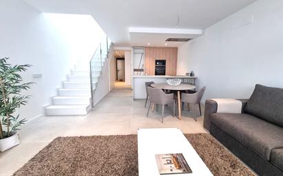 Living room of Single-family semi-detached for sale in Girona Capital  with Terrace and Balcony