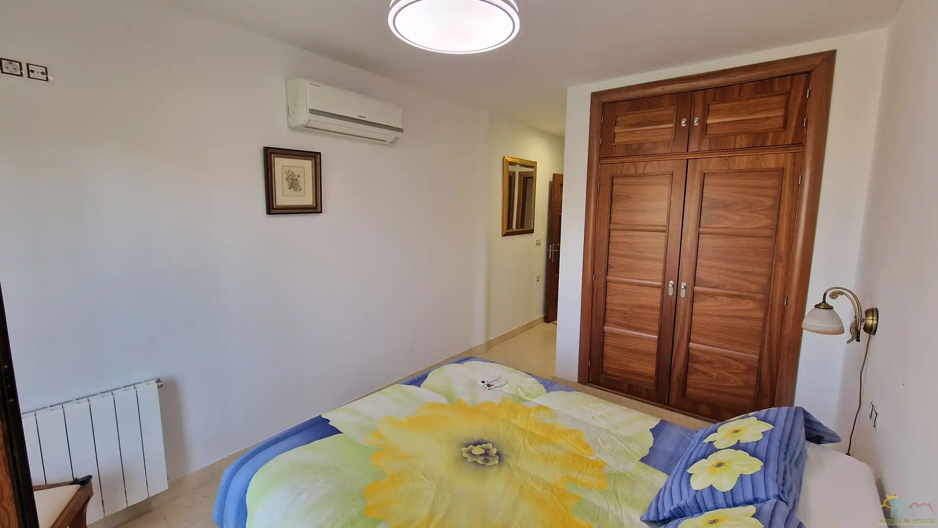 Schlafzimmer von Einfamilien-Reihenhaus zum Verkauf in Diezma mit Klimaanlage, Heizung und Privatgarten