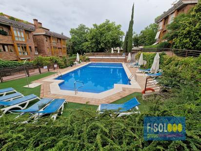 Swimming pool of Attic for sale in  Madrid Capital  with Air Conditioner and Terrace