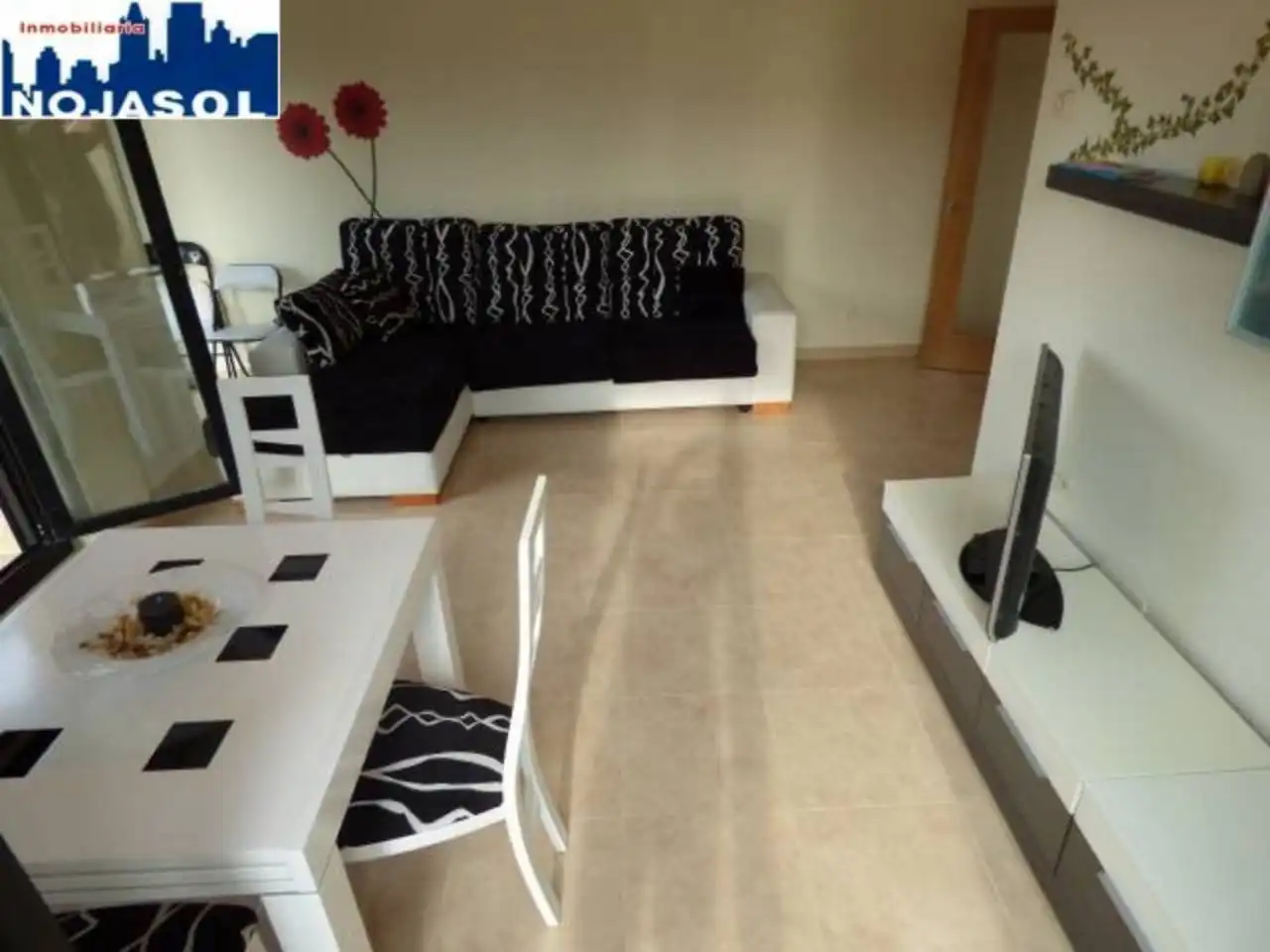 Sala d'estar de Àtic de lloguer en Noja amb Calefacció, Terrassa i Moblat