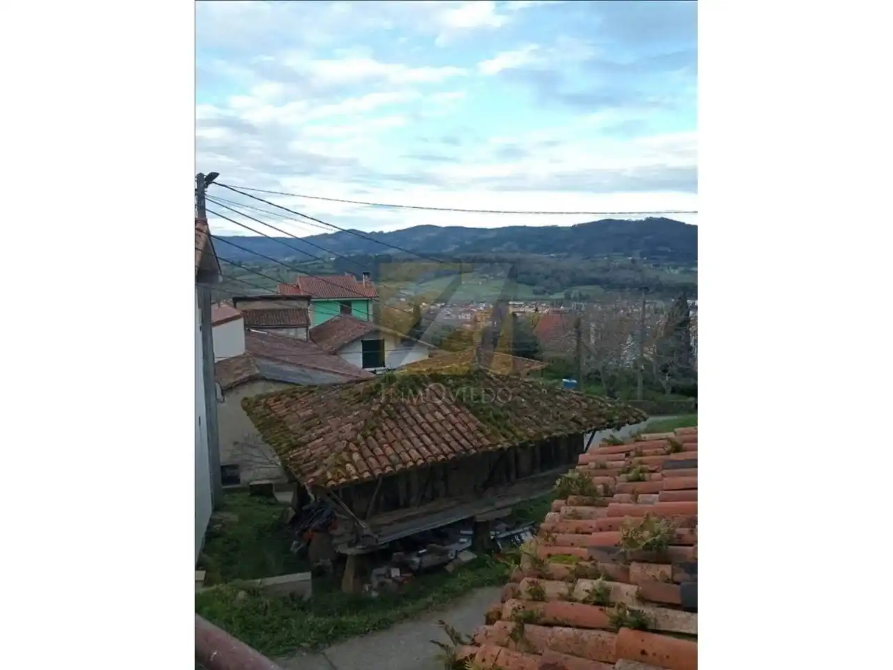 Vista exterior de Casa adosada en venda en Cabranes amb Calefacció, Jardí privat i Terrassa