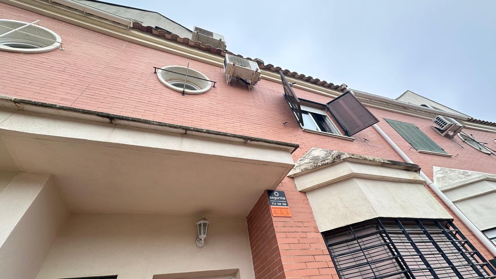 Exterior view of Single-family semi-detached for sale in Coria del Río  with Air Conditioner, Terrace and Furnished