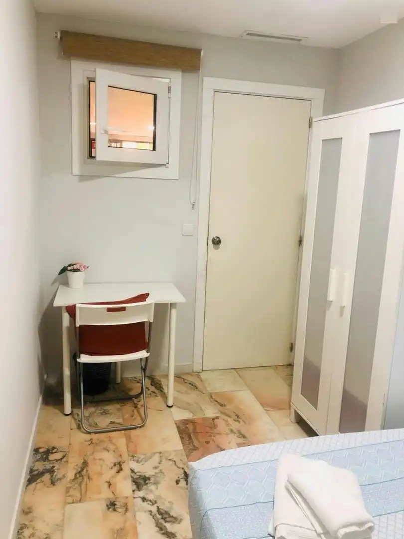 Bedroom of Flat for share in Sevilla  with Private garden and Washing machine