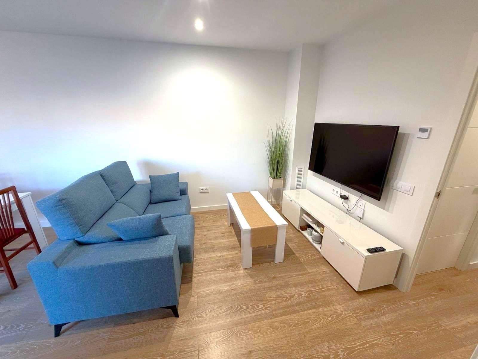 Living room of Flat for sale in Calafell  with Air Conditioner, Heating and Parquet flooring