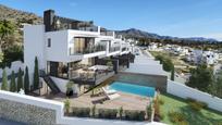 Exterior view of Single-family semi-detached for sale in Nerja  with Air Conditioner, Private garden and Swimming Pool