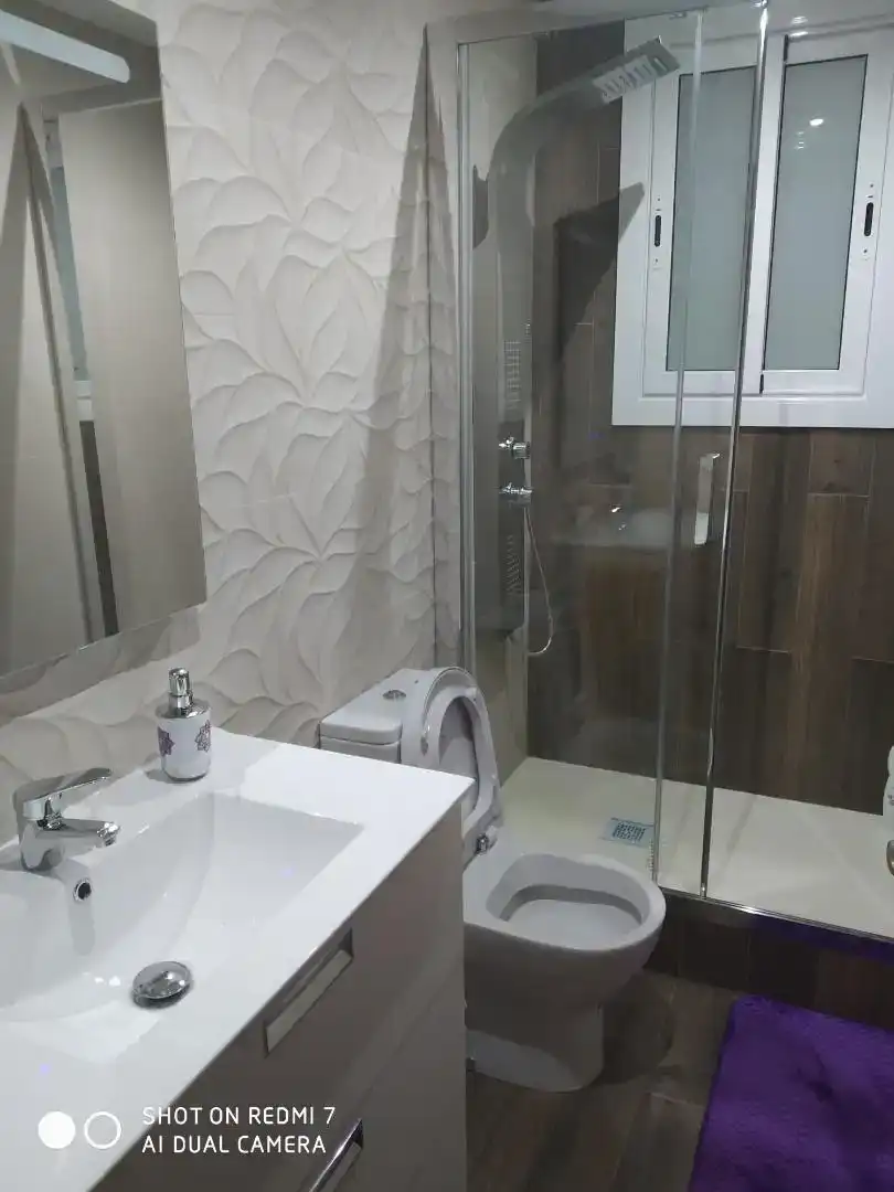 Badezimmer von Wohnung zum Verkauf in Mataró mit Klimaanlage und Balkon
