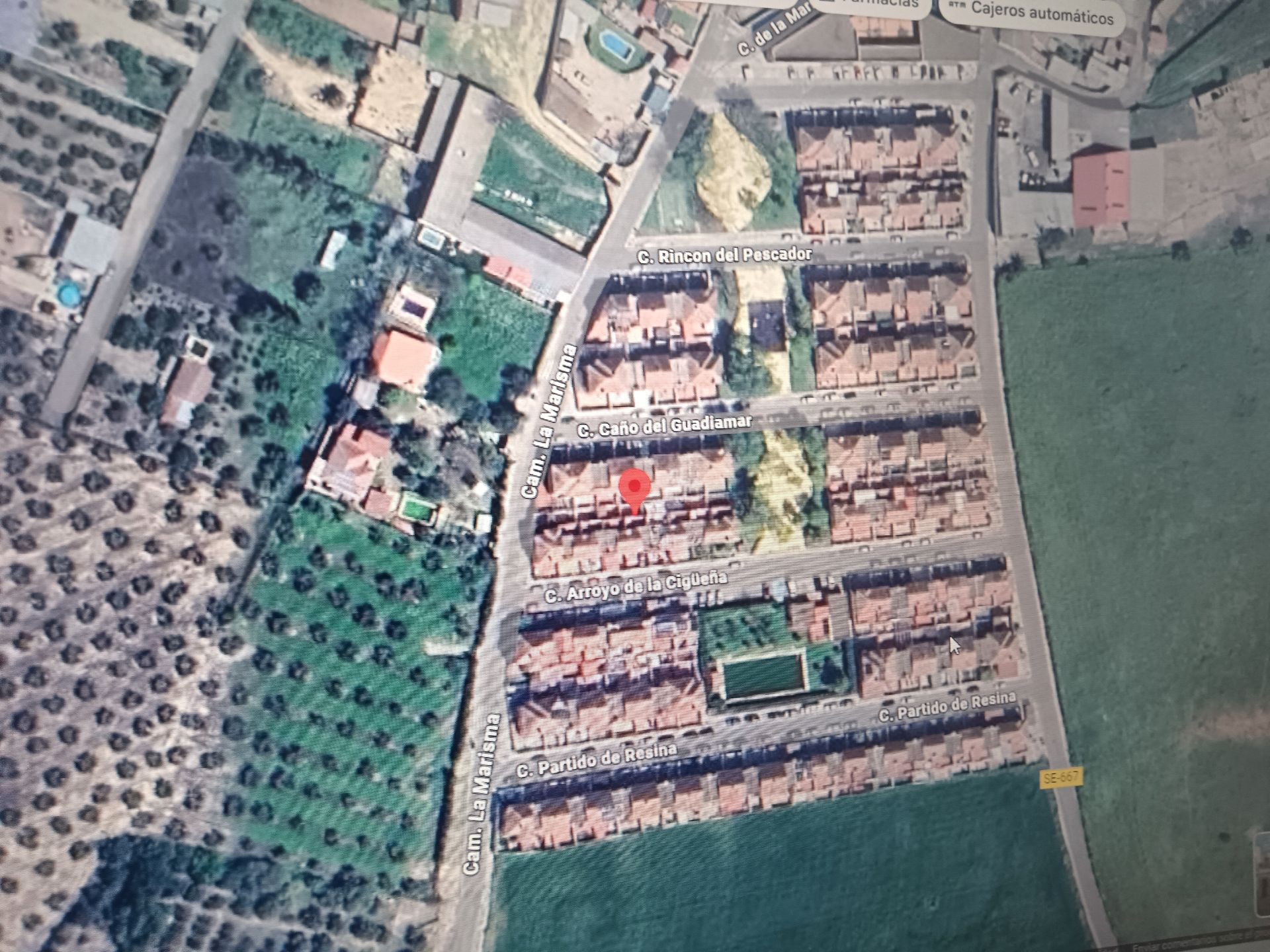 Vista exterior de Casa adosada en venda en Aznalcázar amb Piscina comunitària