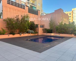 Swimming pool of Duplex to share in  Barcelona Capital  with Air Conditioner, Heating and Parquet flooring