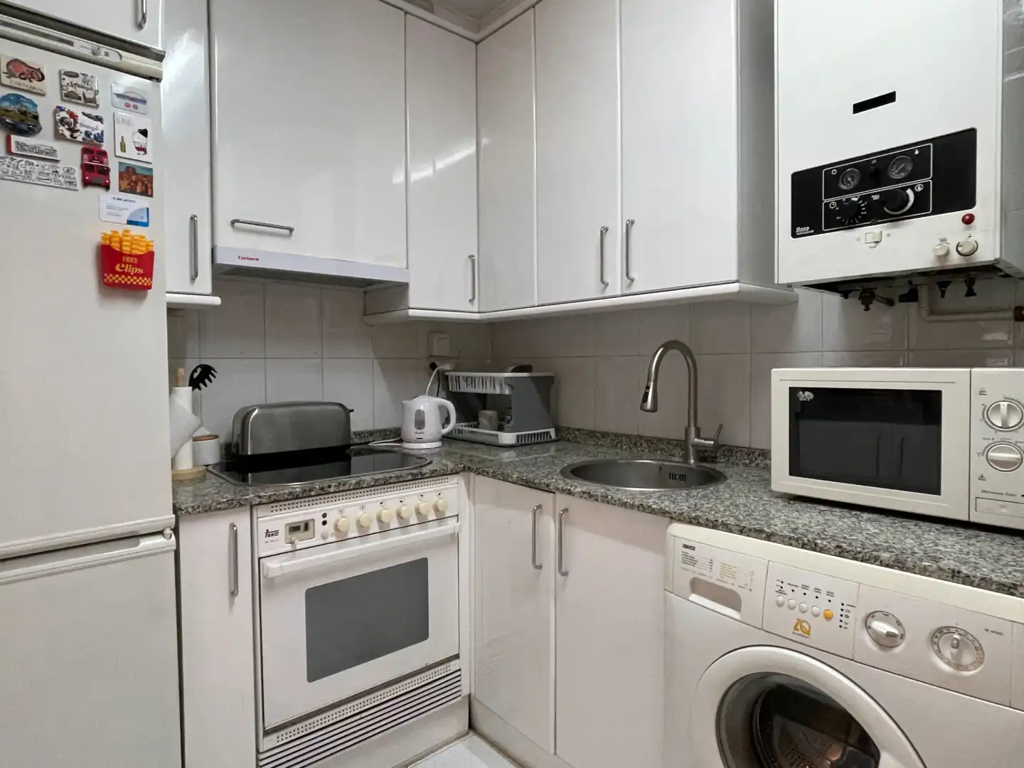 Kitchen of Apartments for sale in Gijón   with Heating, Parquet flooring and Storage room