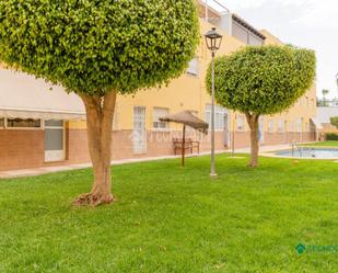 Exterior view of Single-family semi-detached for sale in Roquetas de Mar  with Terrace and Community pool