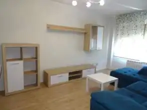 Sala d'estar de Pis de lloguer en Gijón  amb Calefacció, Parquet i Moblat
