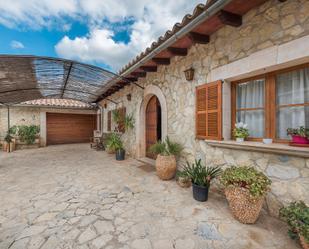 Vista exterior de Casa adosada en venda en Mancor de la Vall amb Piscina