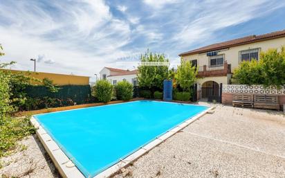 Swimming pool of House or chalet for sale in Cúllar Vega  with Heating, Storage room and Swimming Pool