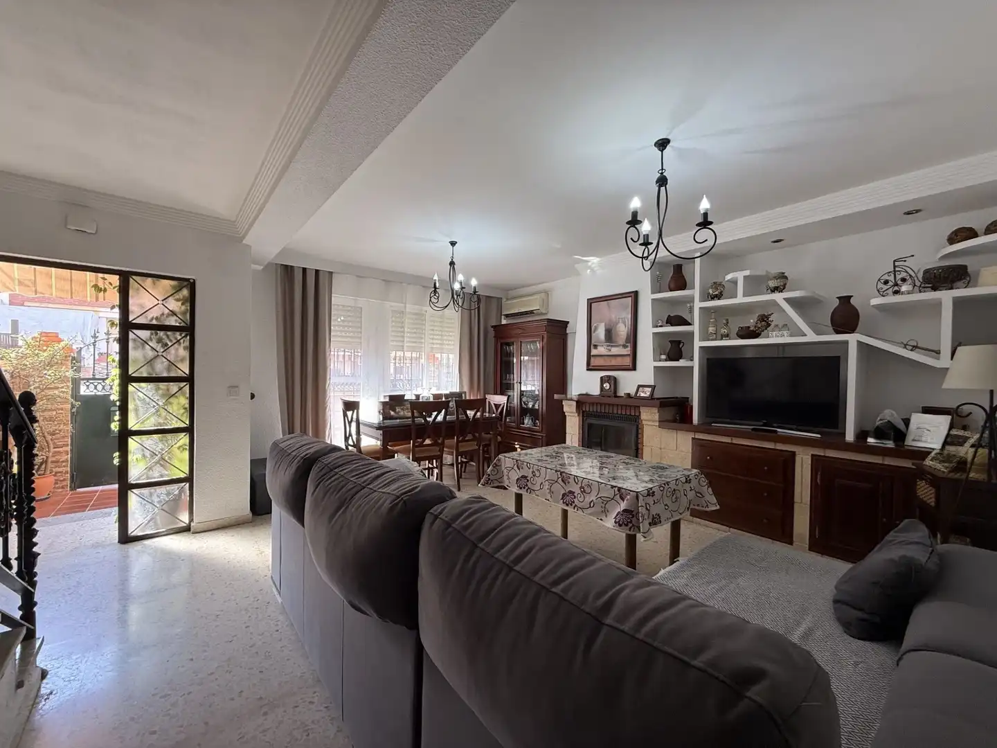 Sala de estar de Casa adosada en venta en Aljaraque con Aire acondicionado