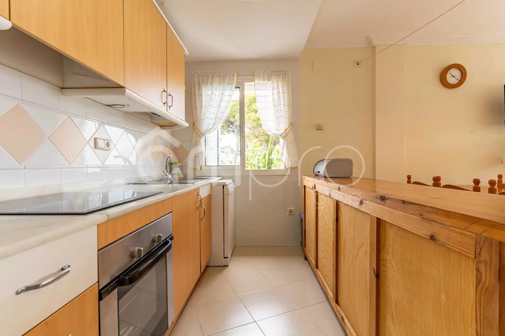 Küche von Wohnung zum Verkauf in Torredembarra mit Klimaanlage, Terrasse und Schwimmbad