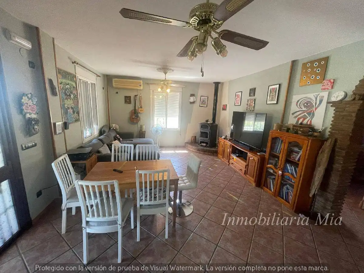 Sala d'estar de Casa o xalet en venda en Coín amb Aire condicionat, Calefacció i Jardí privat