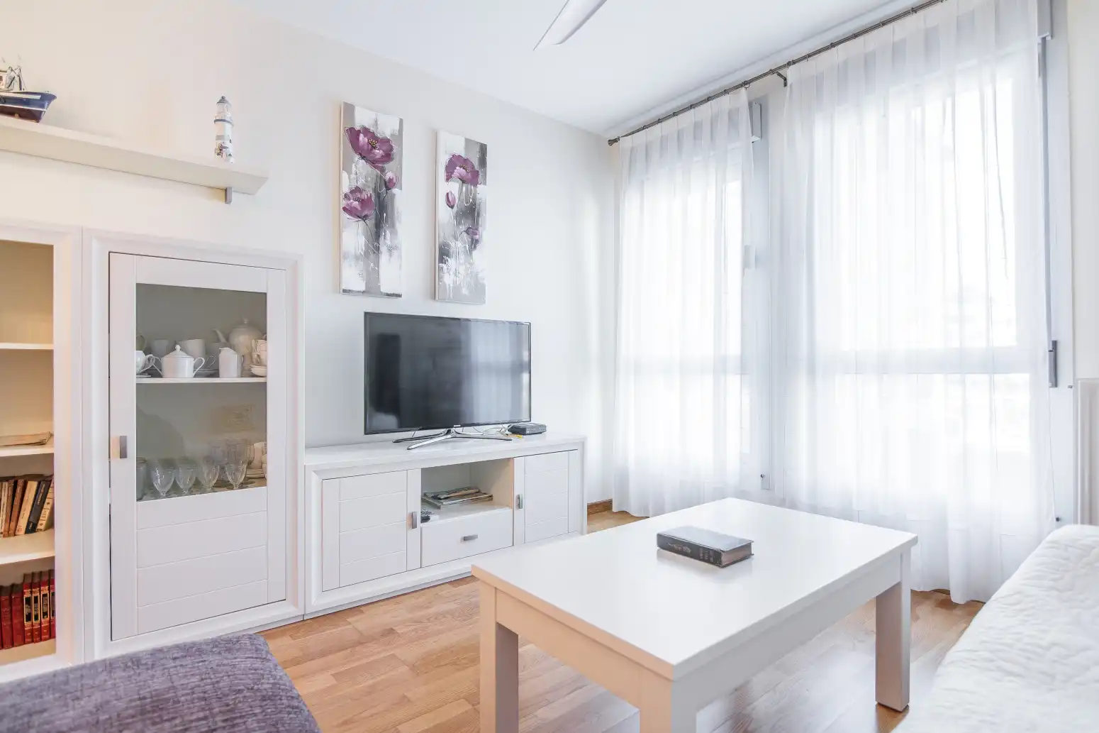 Wohnzimmer von Wohnung zum Verkauf in Gozón mit Heizung, Privatgarten und Abstellraum
