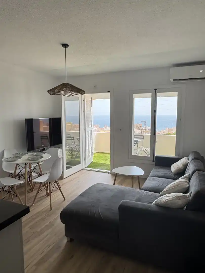 Wohnzimmer von Wohnung zur Miete in Garrucha mit Klimaanlage, Privatgarten und Parkett