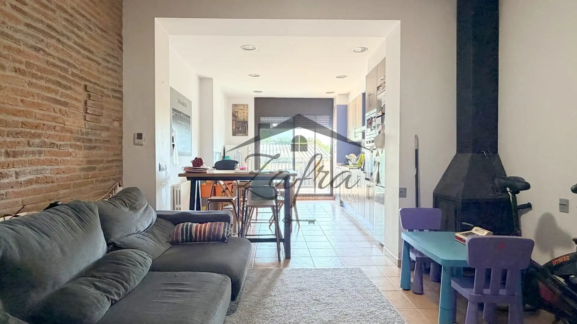 Sala d'estar de Casa adosada en venda en Llagostera amb Calefacció i Terrassa