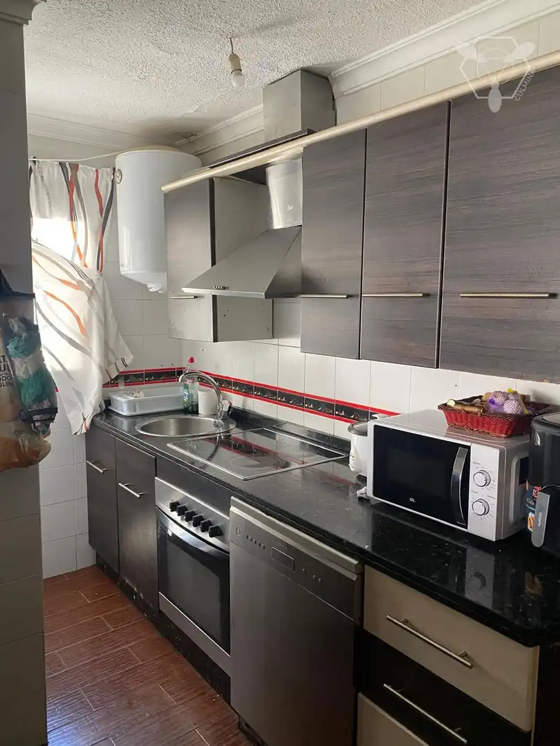 Kitchen of Attic for sale in Huelva  with Air Conditioner, Terrace and Storage room
