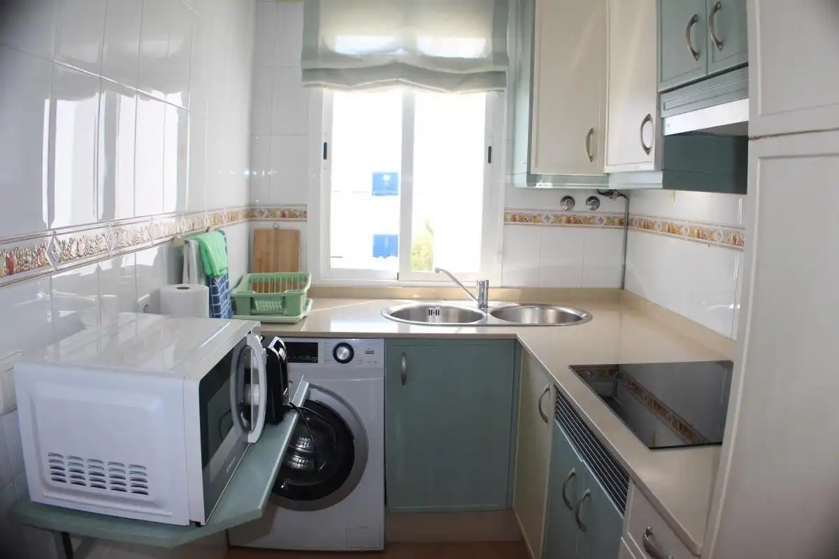 Cocina de Apartamento en venta en Chiclana de la Frontera con Aire acondicionado, Amueblado y Piscina comunitaria