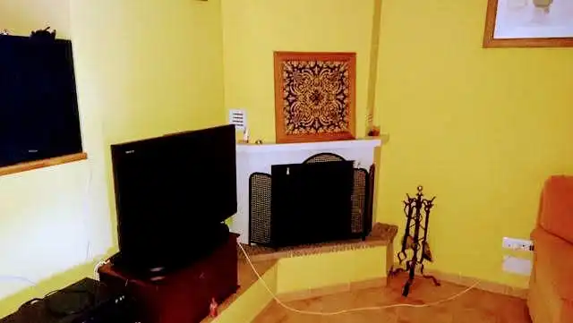 Sala de estar de Casa adosada en venta en Córdoba con Aire acondicionado, Calefacción y Jardín privado