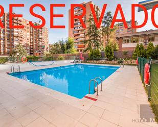 Swimming pool of Flat for sale in  Madrid Capital  with Air Conditioner and Terrace