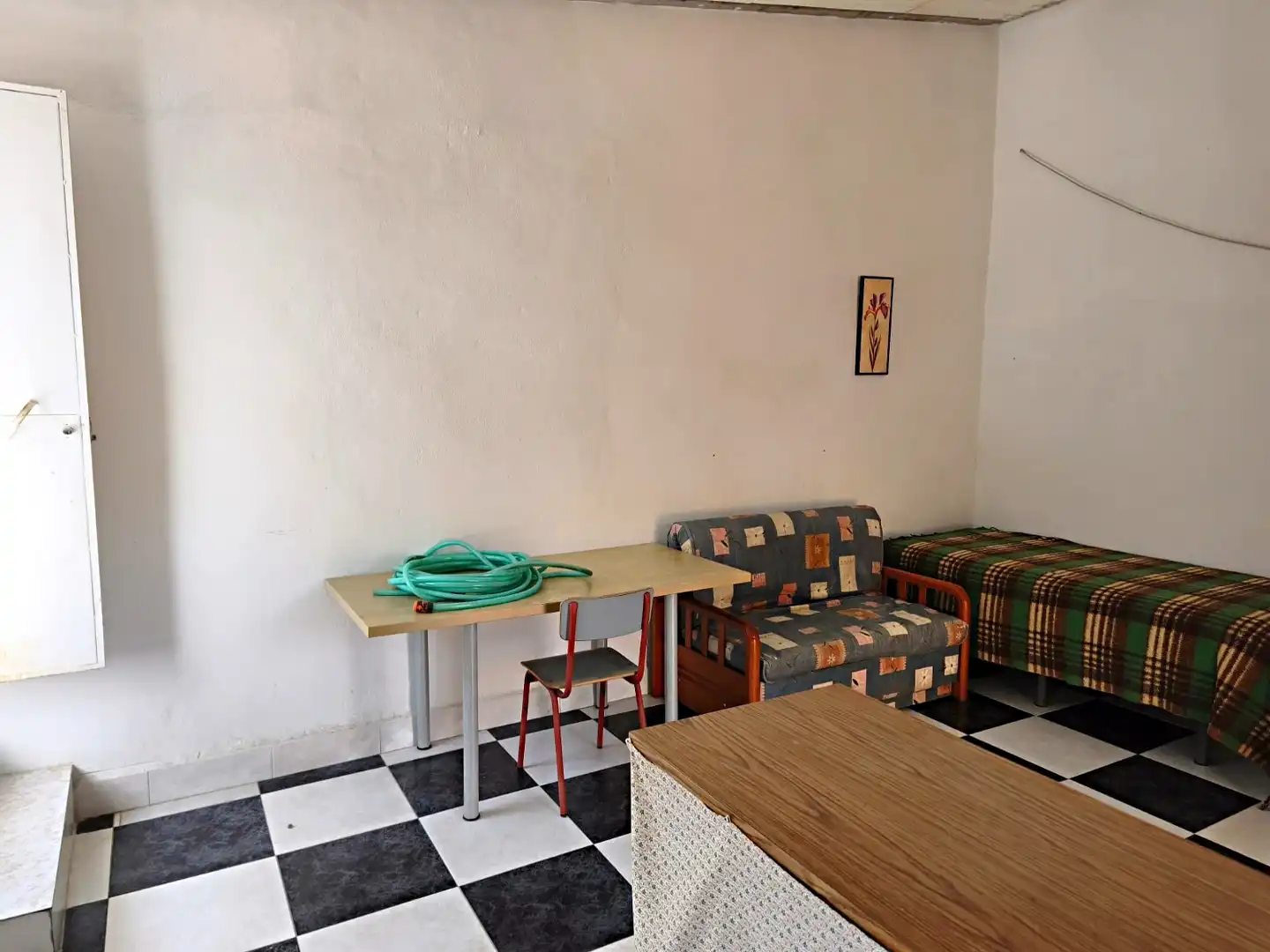 Sala de estar de Casa adosada en venta en Málaga con Aire acondicionado, Terraza y Amueblado