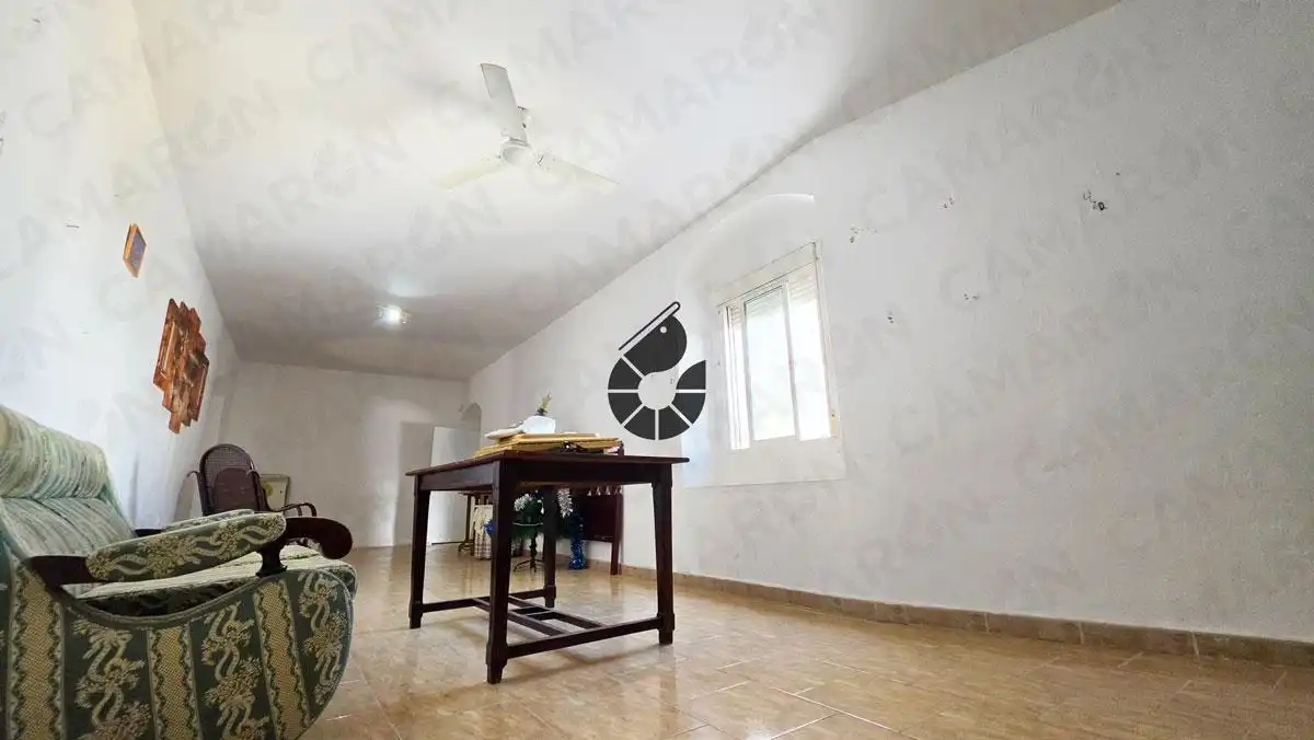 Sala de estar de Casa adosada en venta en Almensilla con Jardín privado, Balcón y Alarma