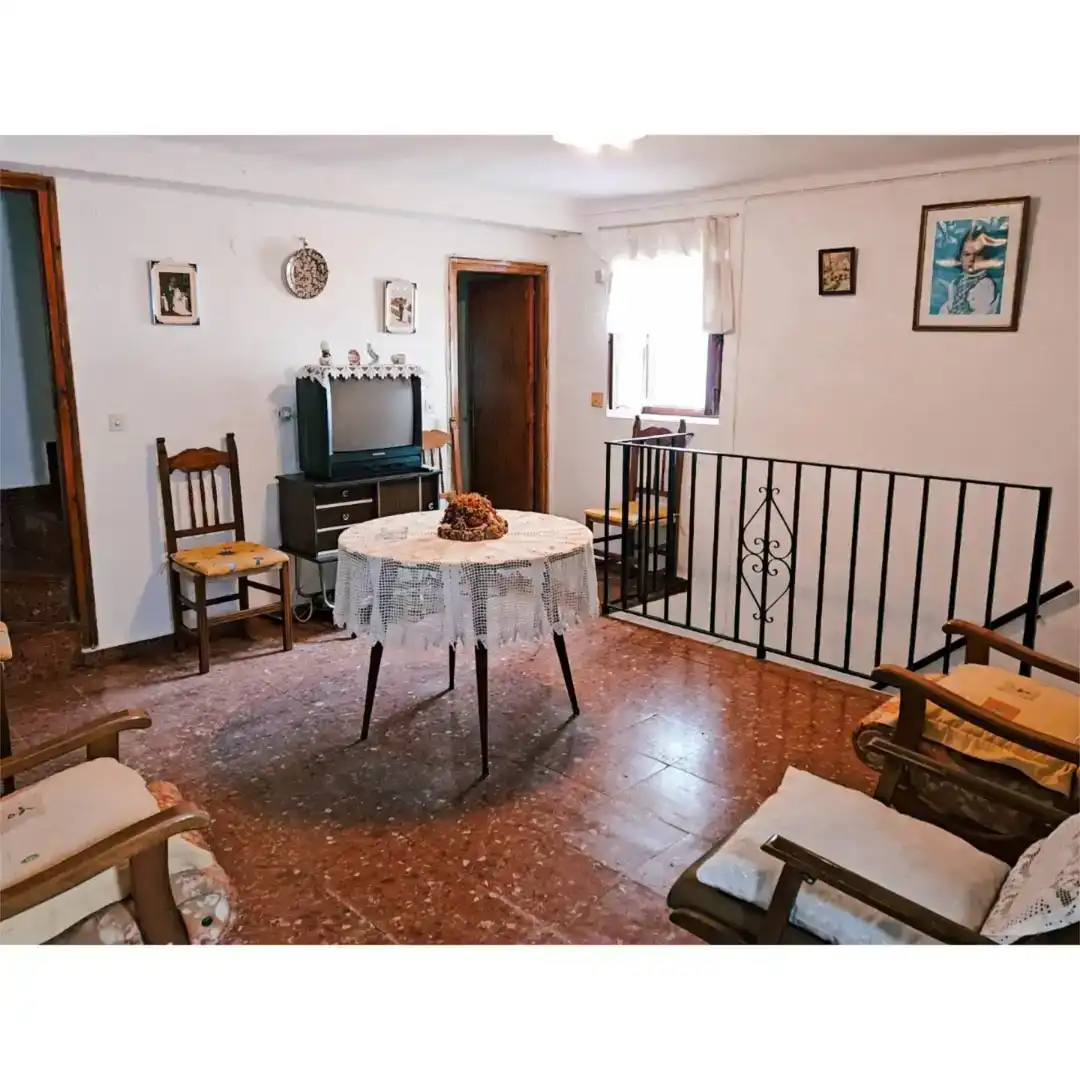 Sala d'estar de Casa adosada en venda en Benadalid amb Traster, Moblat i Rentadora