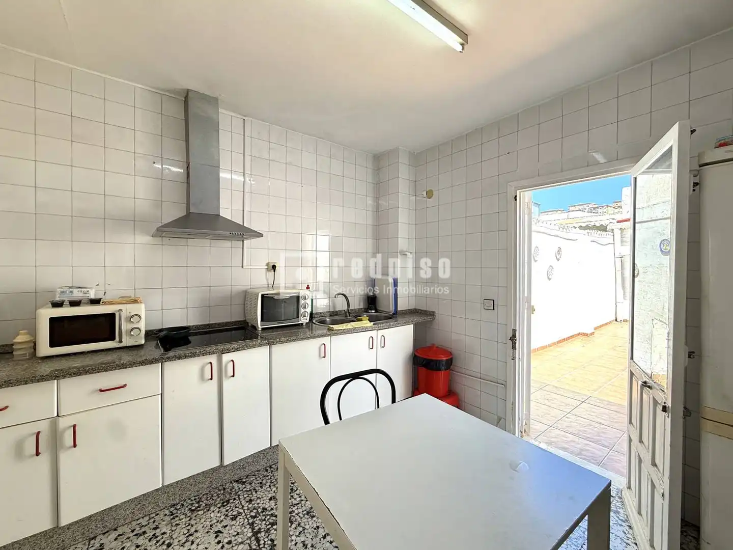 Cuina de Casa o xalet en venda en Málaga amb Terrassa